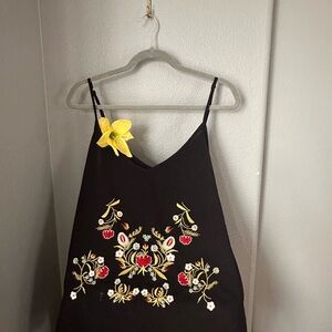 Black Floral Embroidered Camisole flower is just decorative